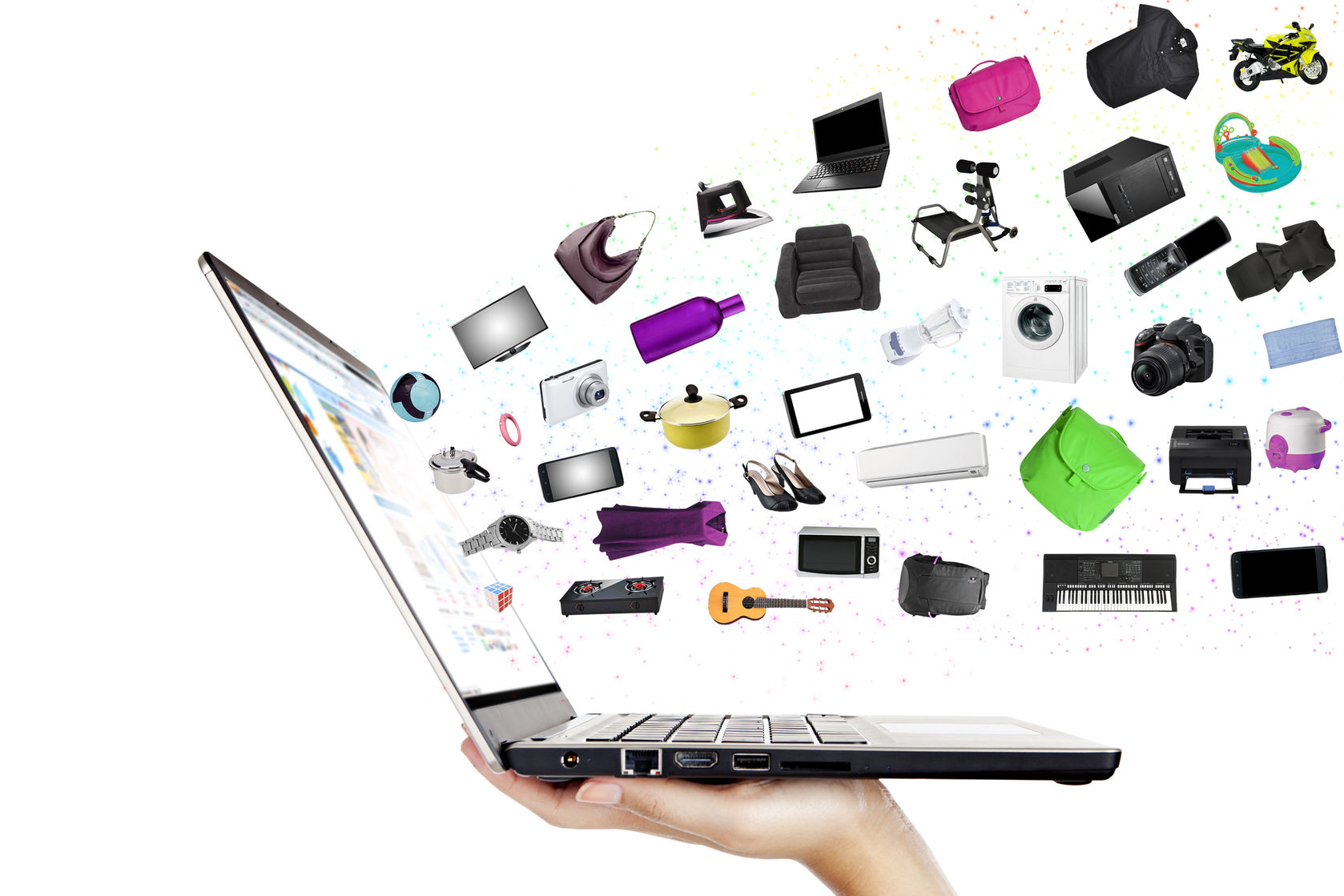 26657533 – modern laptop in the hand with lots of merchandise isolated on white